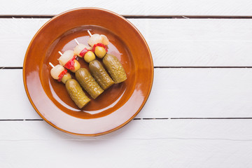 spanish banderillas, skewers with different pickles, such as oli