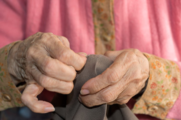 Fototapeta premium Senior sewing