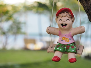 decorated doll dressing garden kid lanscapes outdoor smile swing toy