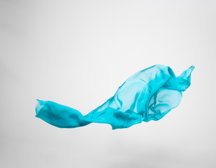 Fototapeta premium abstract teal fabric in motion