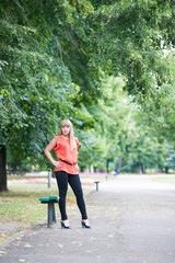 Fototapeta premium Young beautiful girl on a walk in the country