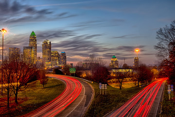 november sun setting over charlotte north carolina skyline