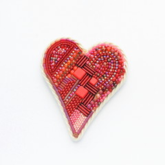 Red heart as craft isolated in white background