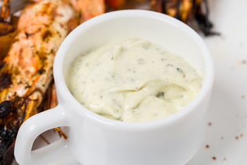 Delicious grilled shrimps on skewers.