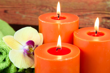 orange burning candle