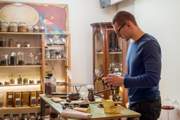 Young man in a private seller store