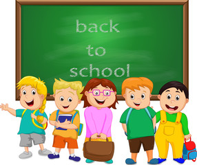 A Small Group of Kids school boy standing in front of chalkboard 