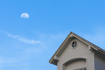 new traditional gable roof  house under moon sky