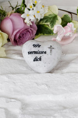 Wir nermissen dich,