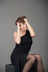 Fototapeta premium cute young girl on the shooting in the studio