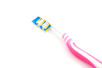 single pink toothbrush
