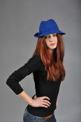 cute young girl on the shooting in the studio