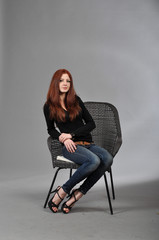 Fototapeta premium cute young girl on the shooting in the studio