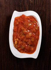 bowl of hot sauce with nachos