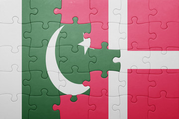 puzzle with the national flag of pakistan and denmark