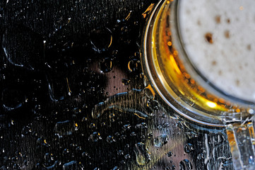 Drops of beer on table