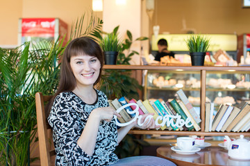 Young beautiful girl on a walk in the country