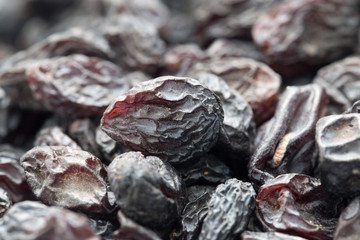 Black raisins as background. macro
