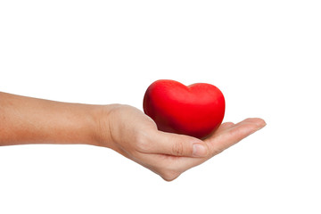 Red Heart in female hand isolated on white