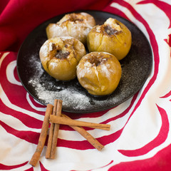 Baked apples with cinnamon.