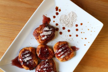 cheesecakes with strawberry jam. Home meal of cottage cheese