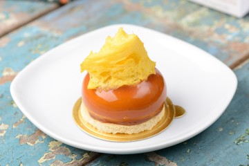 Pumpkin Caramel Dessert on white isolate plate