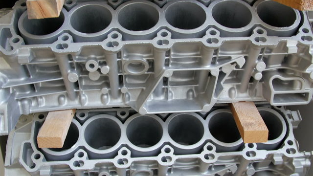 Blocks of engine valves in the machinery of a car. The term engine block is often used synonymously with cylinder block 