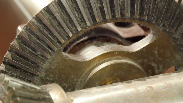 The machine inside the cars engine. It has little rust on it found inside the cars machinery