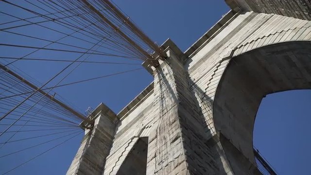 A close up of the Brooklyn Bridge towers and their beautiful architecture.