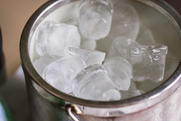 Fototapeta na wymiar Bucket with ice cubes
