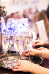 Champagne white wine glasses in wedding party