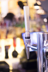 Lager draft beer pump in pub bar