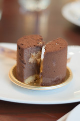 Fototapeta na wymiar eating of chocolate cake in coffee shop