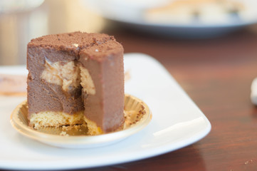 eating of chocolate cake in coffee shop