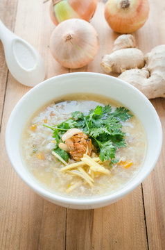 Boiled rice in pork soup with sliced ginger