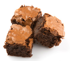 Homemade chocolate brownies over white background
