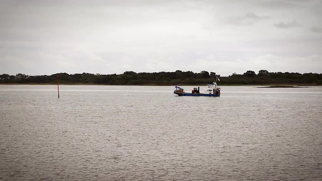 Anchored boat in Brittany, France. Cinemagraph seamless loop