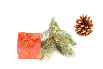 Pine branch with cone and gift box
