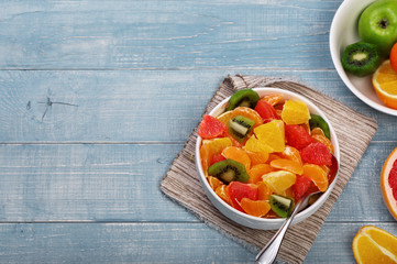 fruit salad with tangerine, grapefruit, orange, kiwi