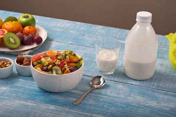 Delicious breakfast of fruit salad and yogurt