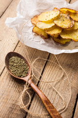 Homemade potato chips with spices