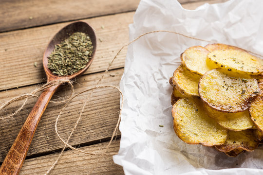 Homemade potato chips with spices