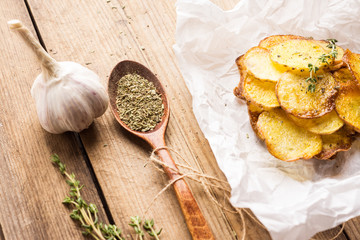 Homemade potato chips with spices