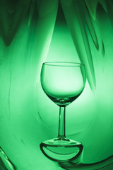 Wine glass on an abstract colored background