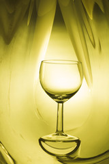 Wine glass on an abstract colored background