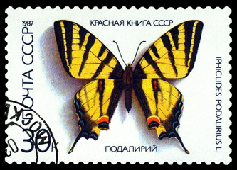 Fototapeta na wymiar Stamp. Butterfly Podalirius.