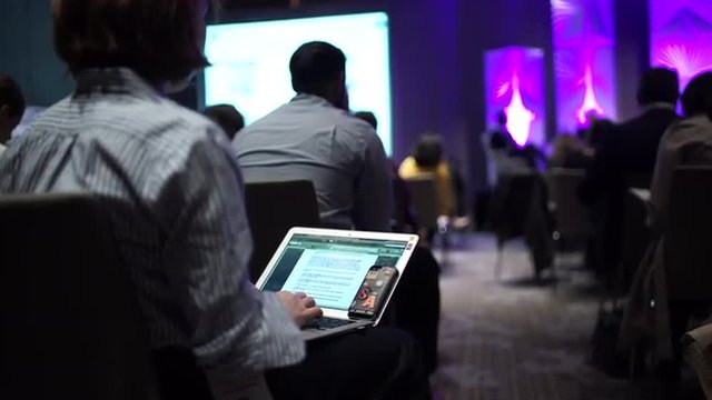 Scene of the Modern professional using Business Technology