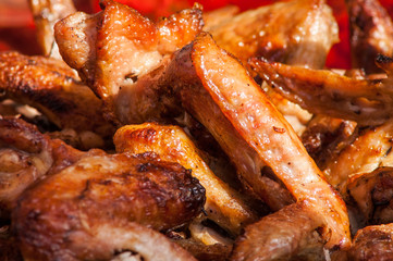 juicy chicken wings on an open fire