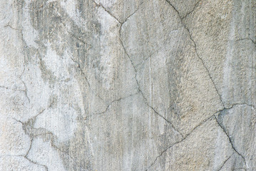 Cracked concrete wall textured or background.