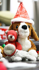 Santa dog / A picture of Santa dog doll and its friends